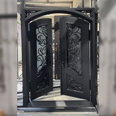 Iron double door with scrollwork and curved panel details