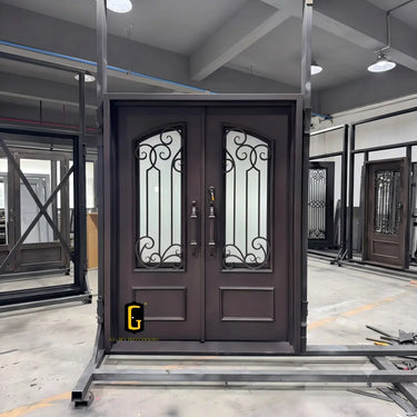 Custom iron double entry door with bronze-style finish