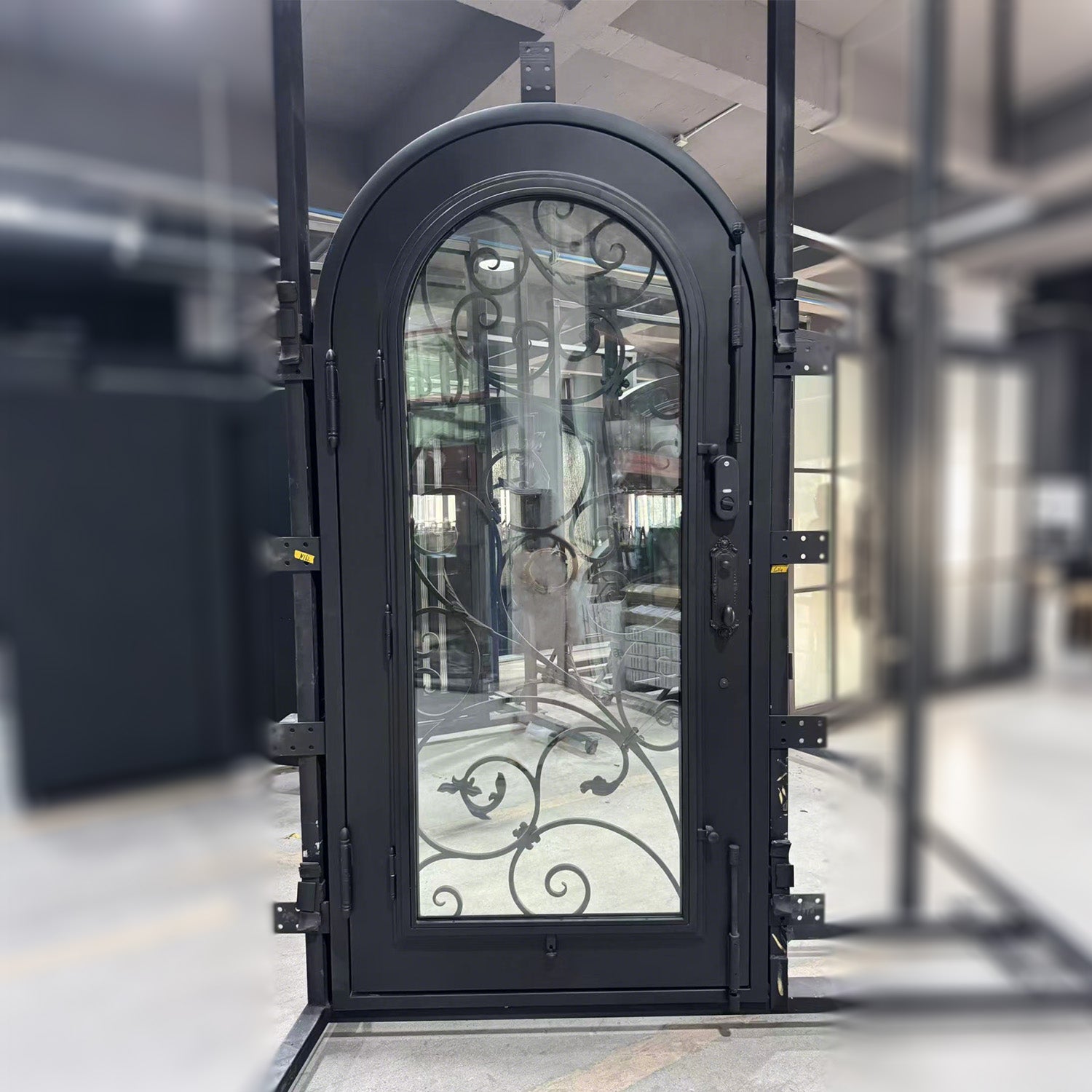 Decorative black metal door with glass panel
