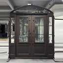 Custom iron French front door with kickplate