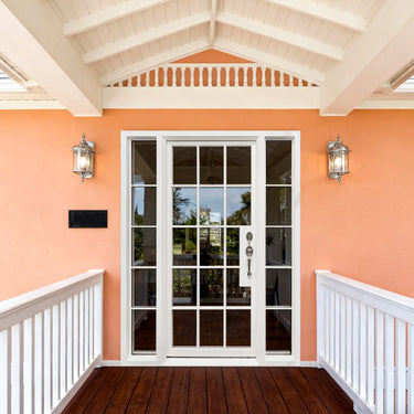White wrought iron French single door with sidelights