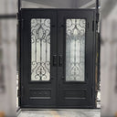 Black wrought iron double entry door with lower kickplates