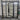Black iron entry door with narrow sidelights