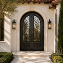 Fully arched wrought iron double entry door with scrollwork
