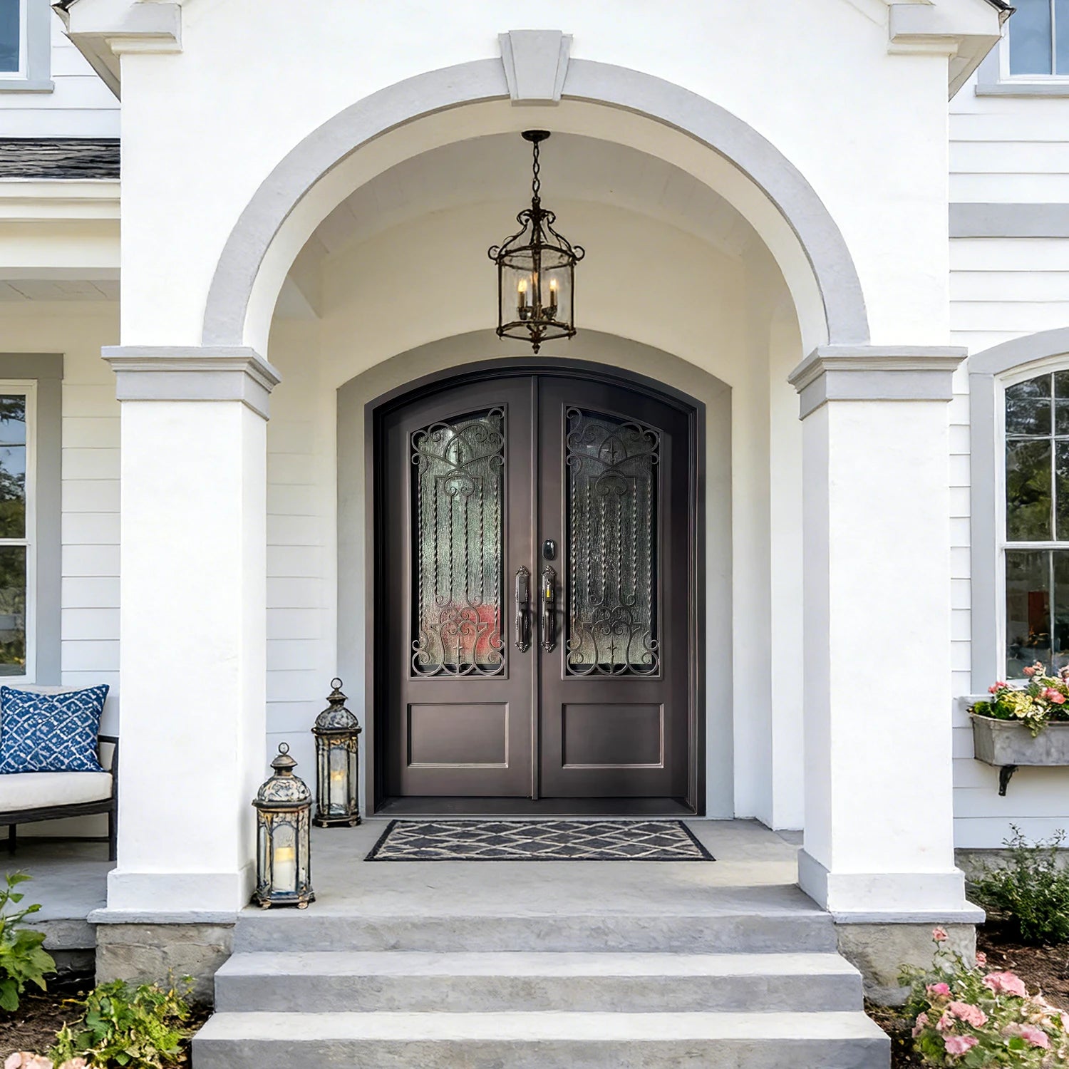 GID Iron double front door with arched top and kickplate