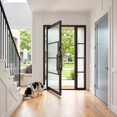 Modern pivot enrty door with one sidelight and rainstorm glass