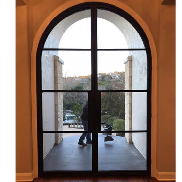 wrought iron french double door with clear glass and round door top