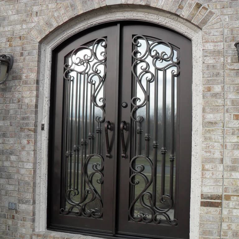 arched top Iron front double door with bug proof screen and high duty scollwork