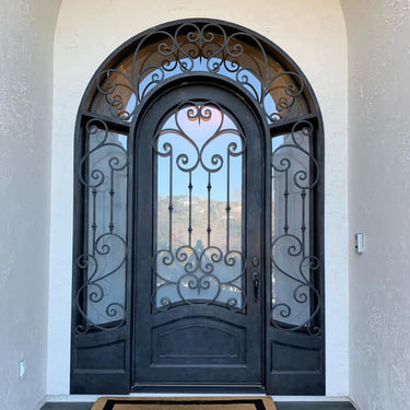arched transom arched top Iron double door with scrolled design