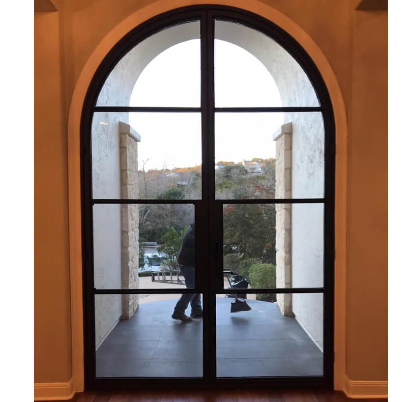 wrought iron french double door with clear glass and round door top
