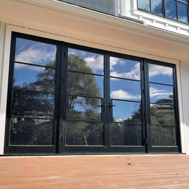 big size iron french double door with two big sidelights and clear glass