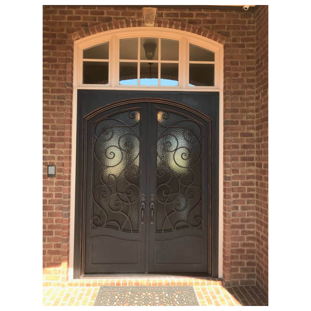 double iron door with decorative scrollwork and square top arched inside