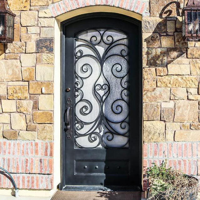 single door with kickplate and flower scrollwork