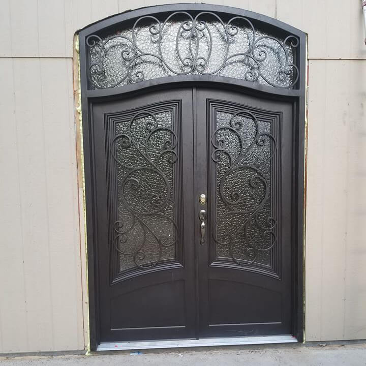 double iron door with aquatex glass and arched top