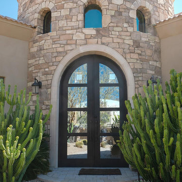 iron french double door with round top and hurricane proof glass