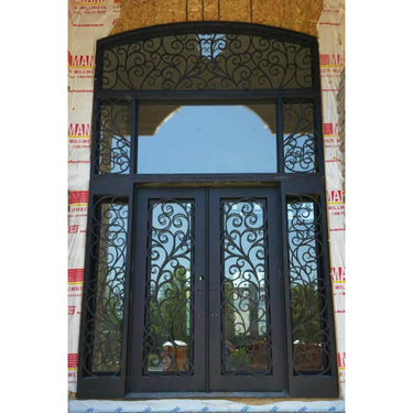double iron door with two sidelights and huge transom