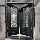 Square top wrought iron front door with hand-forged scrollwork
