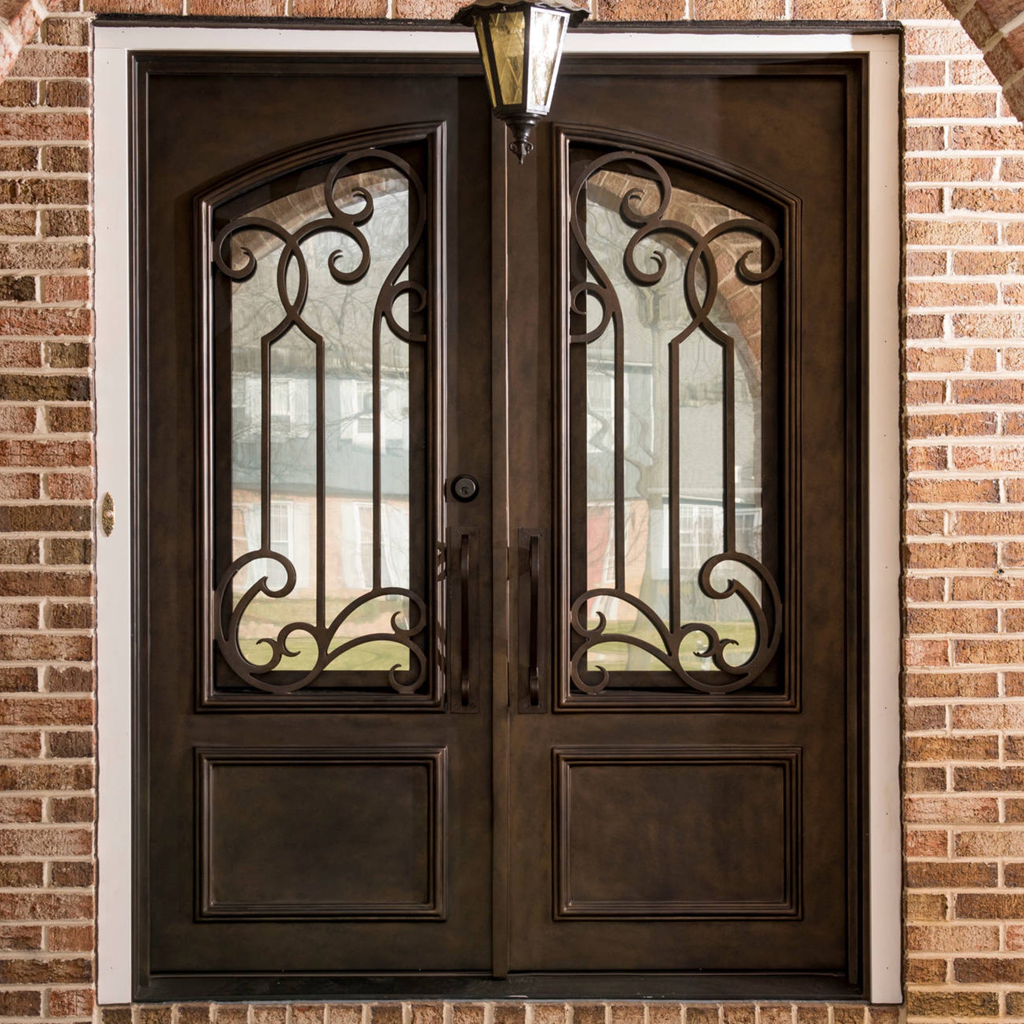 gid  classical style iron front double door with scrollwork