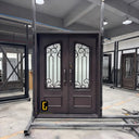 Custom iron double entry door with bronze-style finish