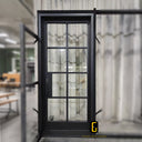 Custom iron single front door with divided glass