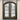 Custom wrought iron French door with arched top