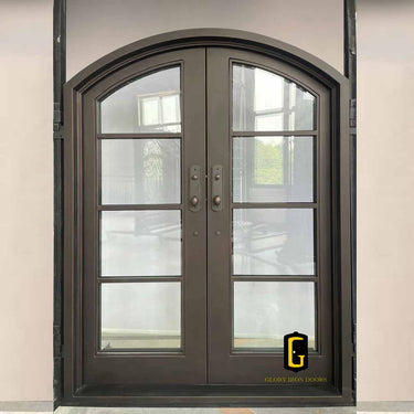 Custom wrought iron French door with arched top