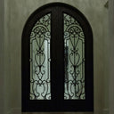 iron front double door with aquatex glass and round top