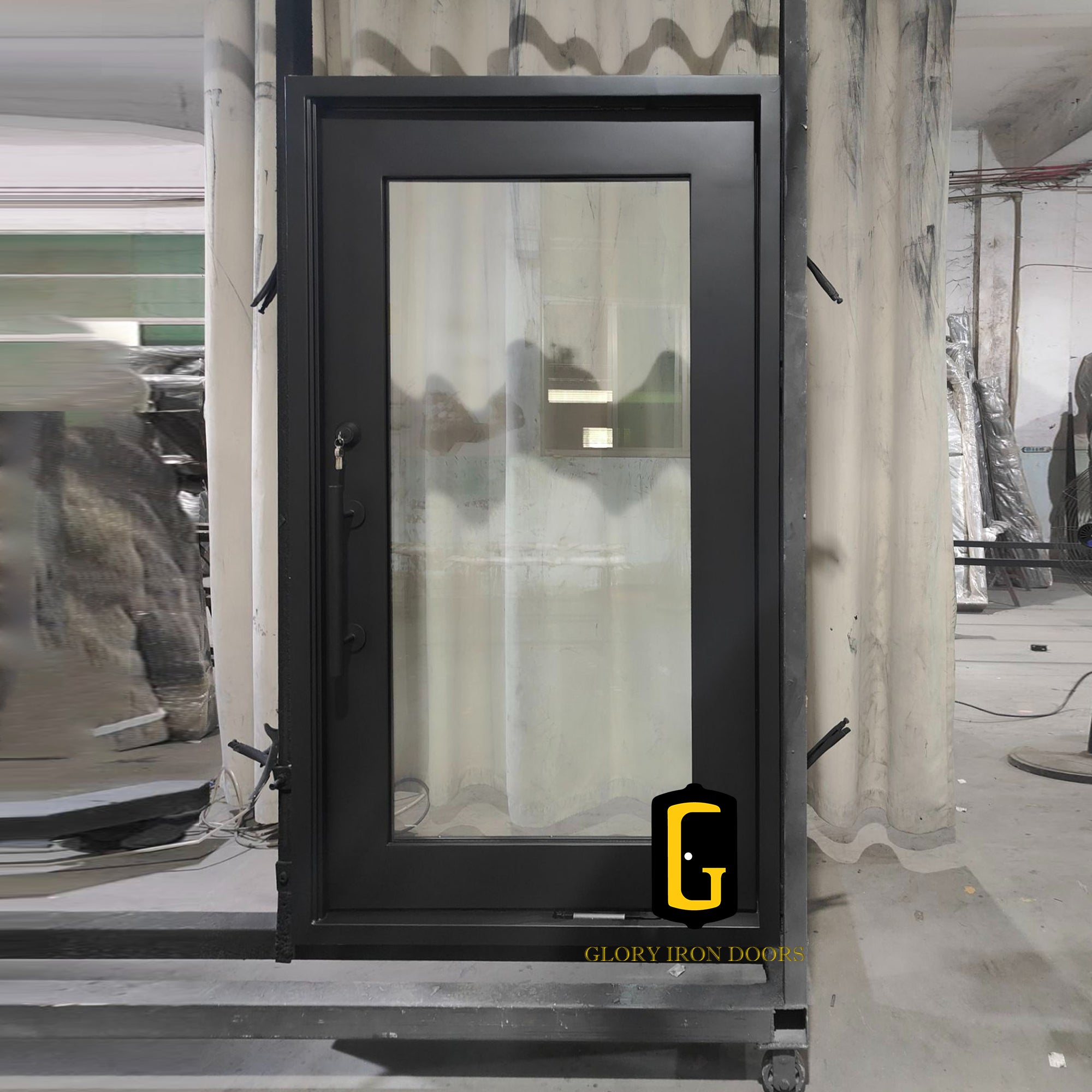 gloryirondoor custom made iron pivot single door with black color and clear glass