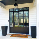 Iron French front door with sidelights and kickplate