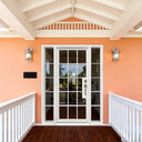 White wrought iron French single door with sidelights
