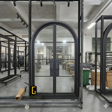 Classic wrought iron French door with rounded top