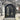 Square frame wrought iron double door with rounded interior profile
