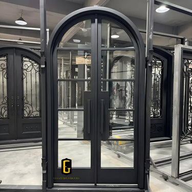 Iron French front door with round top and kickplate