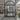 Single iron French front door with side lights and upper round transom