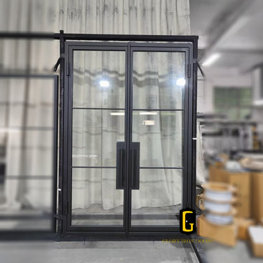 Double iron front door with glass sidelights and transom