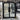 Eyebrow arched iron French door with 4 lite glass