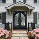 Decorative wrought iron front door with frosted glass