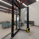 Custom iron pivot entry door with full clear glass