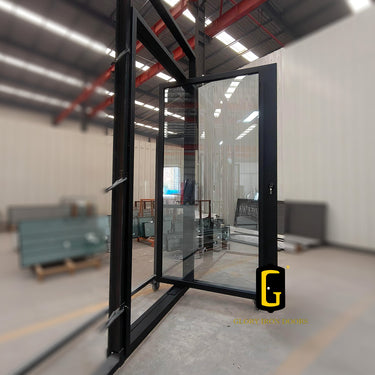 Custom iron pivot entry door with full clear glass