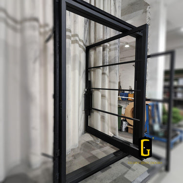 Modern black iron pivot door with 4 lite clear glass design