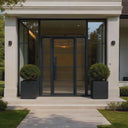 Square iron French front door with narrow sidelights