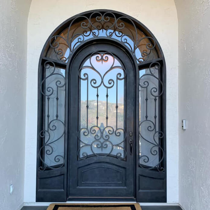  arched transom arched top Iron double door with scrolled design