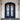 double iron door with matte black frame and arched top