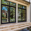 Large steel French door with transom and clear glass
