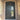 double iron door with arched top and transom