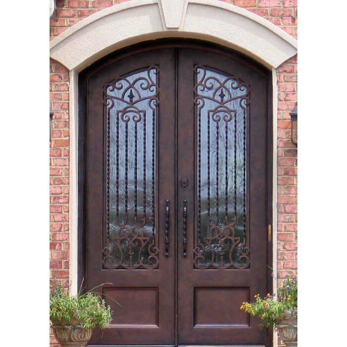 double iron door with decorative grille and arched top