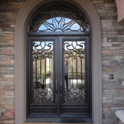 GID forged iron front double door with round transom