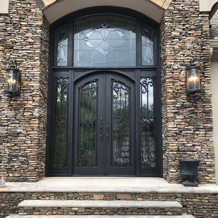 double iron door with two sidelights and transom