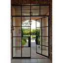 Large exterior iron French door for tall entry