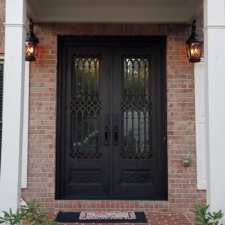 double iron door with decorative grille and square top